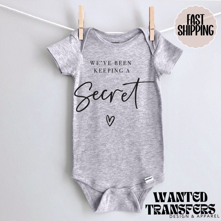 We've Been Keeping a Secret Pregnancy Announcement Onesie®, New Baby Bodysuit, Reveal Pregnancy Announcement, Cute, Trendy Bodysuit